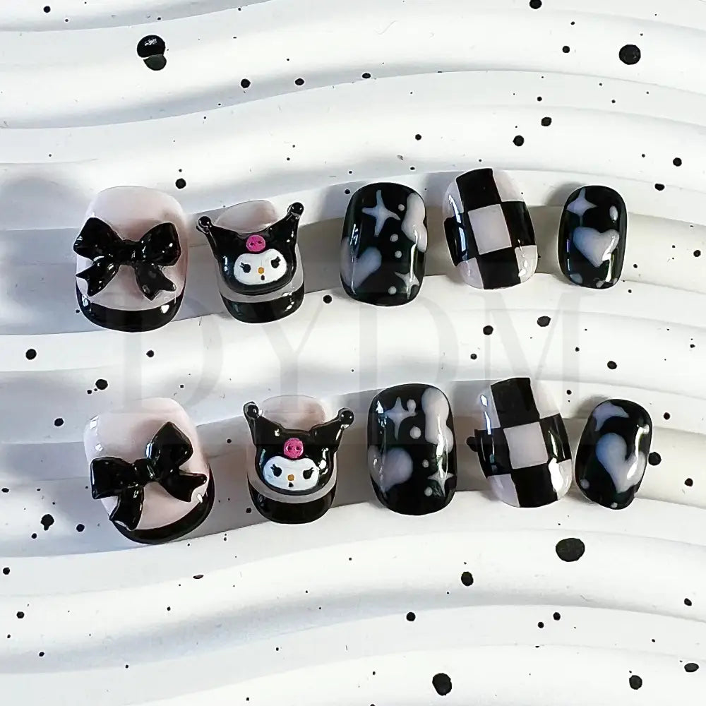 Black Pink Kuromi Kuromi inspired handmade reusable press on nails featuring a bold black and sweet pink color scheme, adorned with hearts and chess patterns