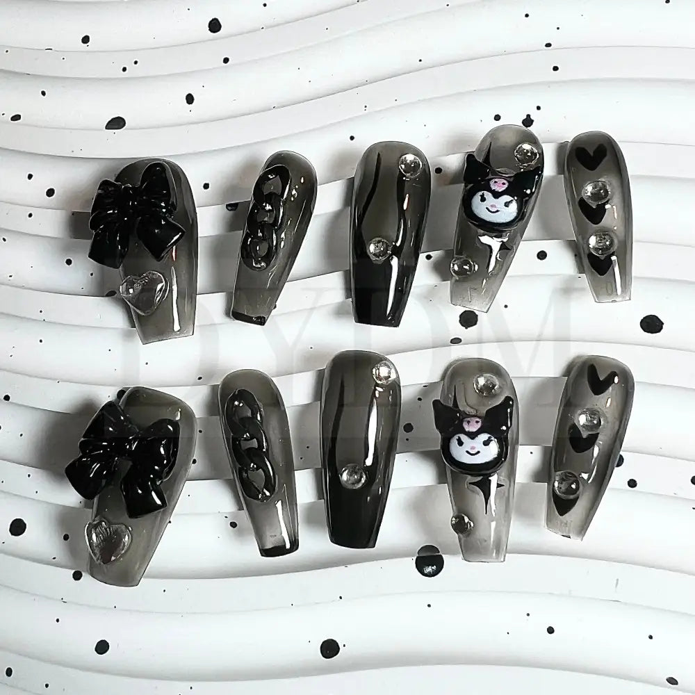 Wicked Kuromi Transparent black handmade press on nails that showcases the iconic Sanrio character, Kuromi, capturing her mischievous charm with edgy and sophisticated style 