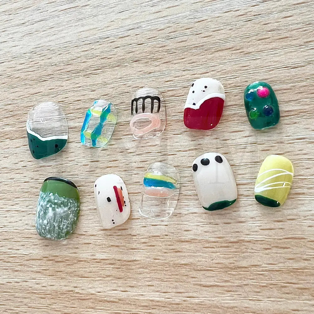 Color Crush Vibrant short, round, handmade press-on manicure with playful and unique designs in a variety of vibrant colors