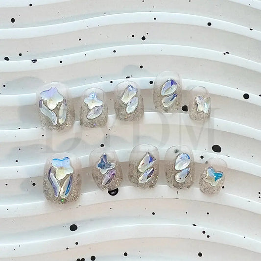 Crystal Crush Handmade reusable nails with a dazzling bling effect, featuring sparkling crystal gemstones that add a captivating shine and draw attention to your fingertips.